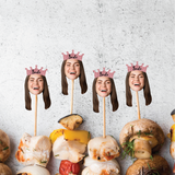 Bamboo party skewers with Brides face wearing a bride crown with a textured white background.