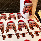 Christmas Face Photo Stickers of a woman wearing a santa hat