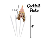 blond woman wearing a glitter pink party hat on a clear cocktail pick