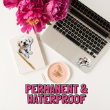 waterproof pet sticker cut out of a dog sticker on a laptop on a white background with pink flowers