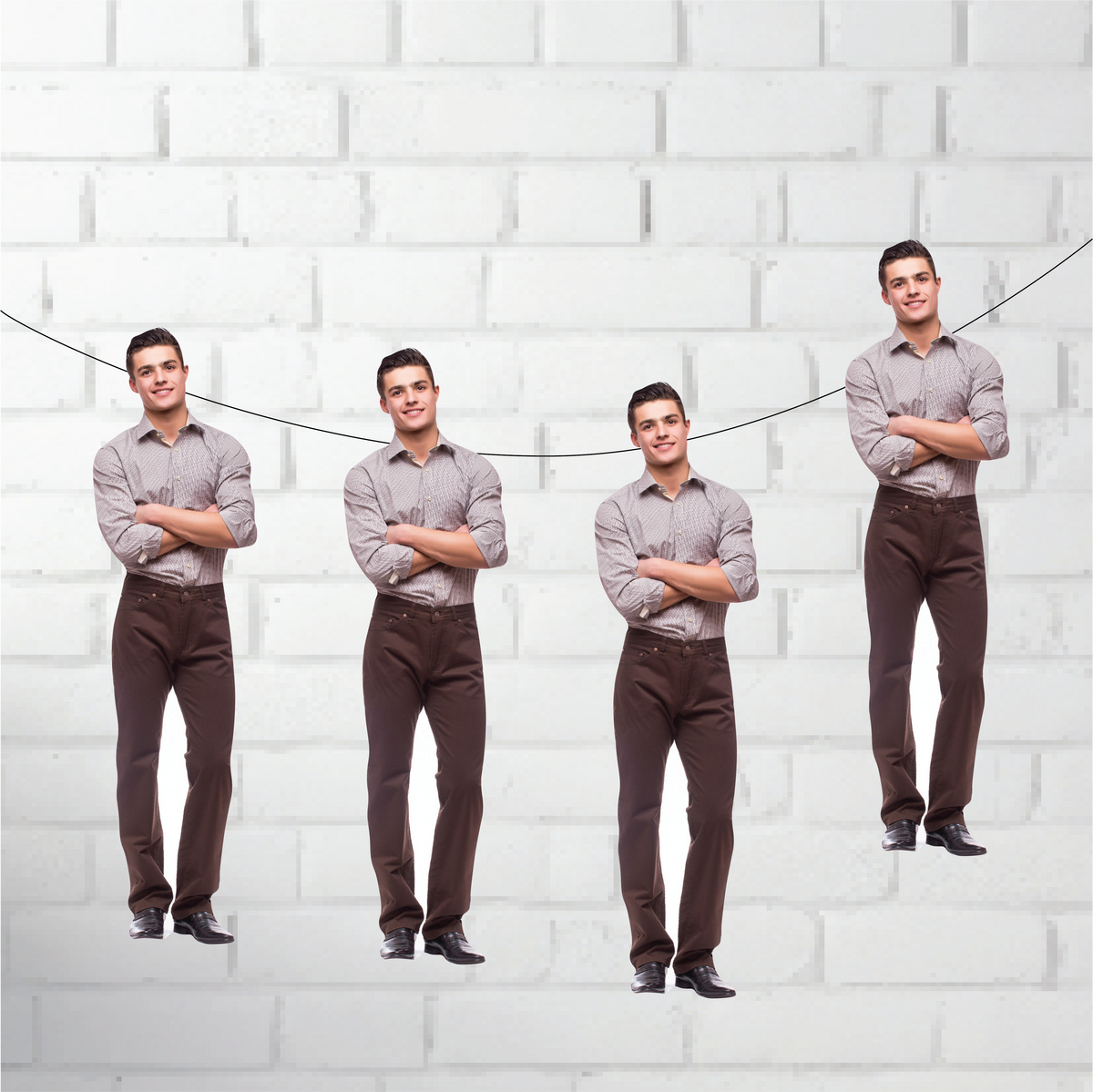 Four identical men standing against a white brick wall.