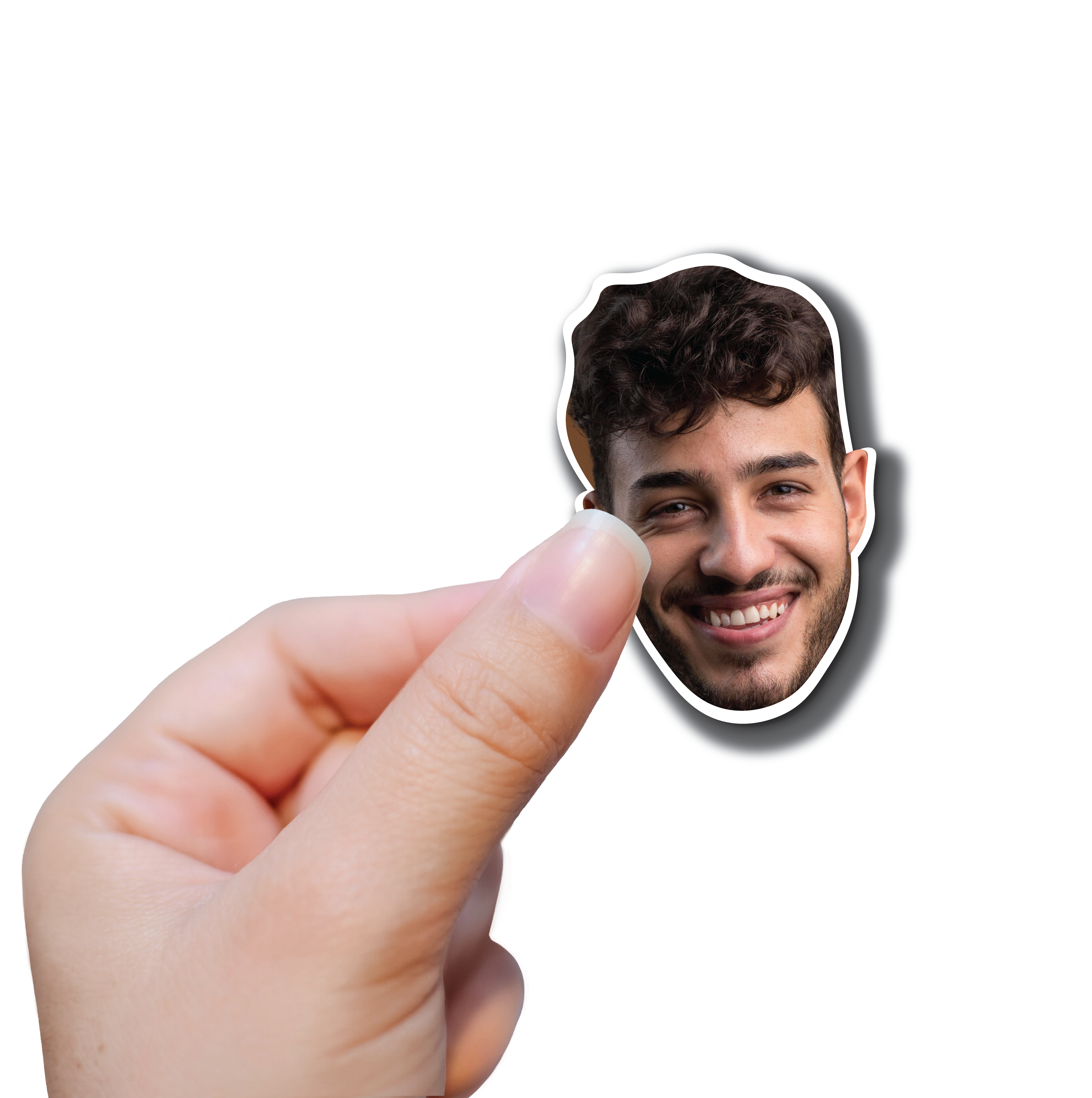 Hand holding a single vinyl photo sticker of a young mans face