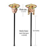 man and a womans faces wearing sombreros on drink stir sticks