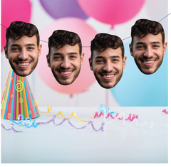 Four smiling faces with a colorful birthday hat and balloons on a light blue background